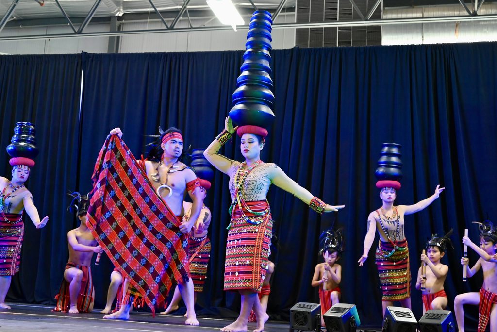 A Filipino dancer dances the Igorot dance